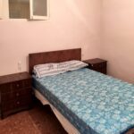 Pis per reformar venda al Berguedà Gironella-habitació llit-Immobles Buscallà Immobiliària-200vp