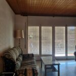 Gironella-lloguer pis moblat amb pàrquing-menjador sofa-Buscallà Immobiliària al Berguedà-211lp
